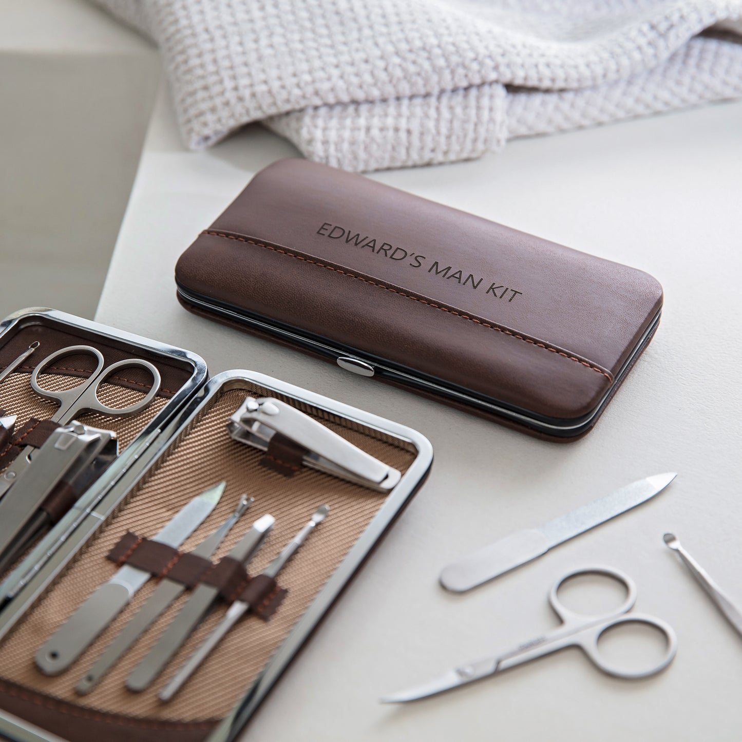 
                  
                    Brown PU leather men’s manicure kit. Personalise as a thoughtful birthday gift for him, or a practical Father’s Day gift.
                  
                