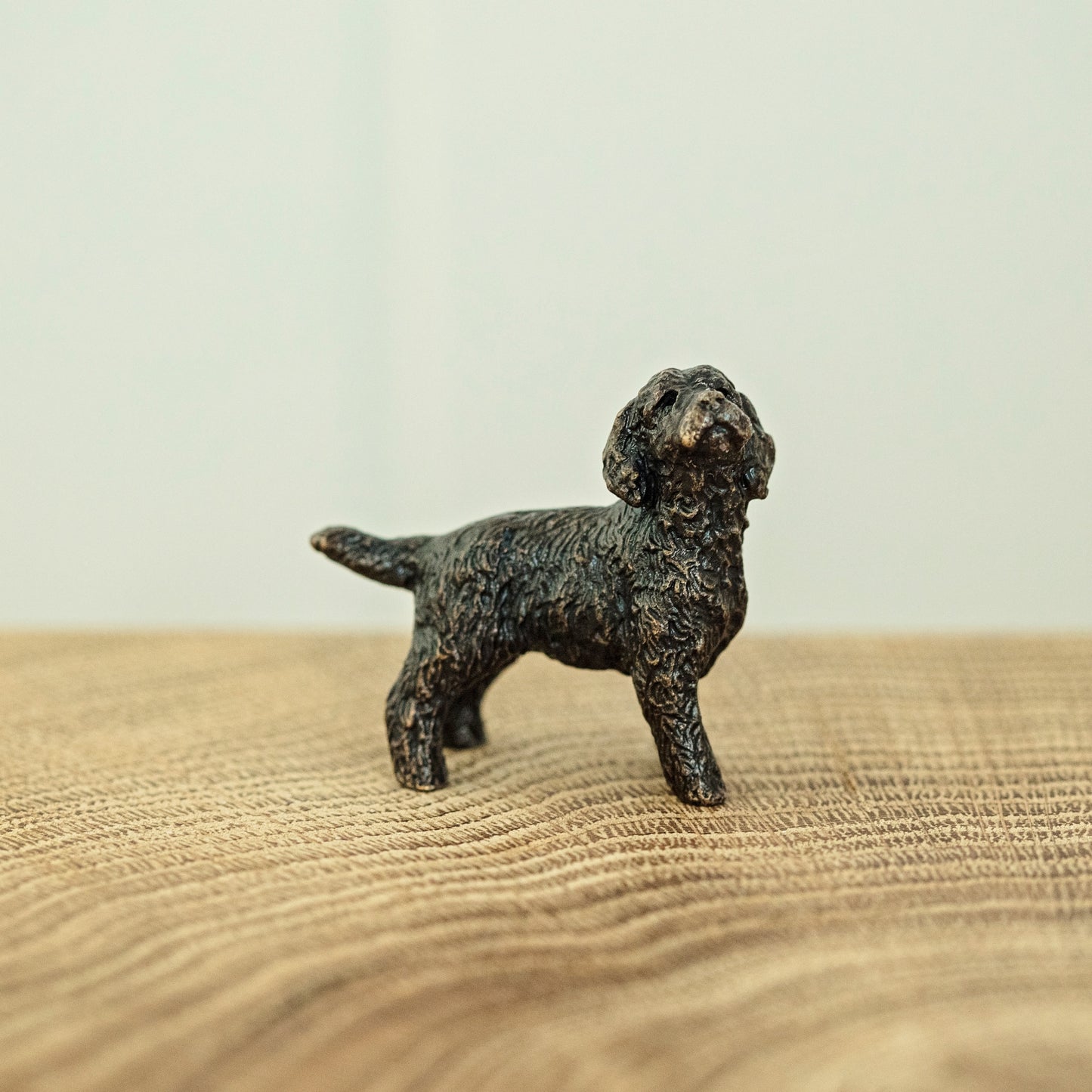 
                  
                    Miniature bronze figurine of a cockapoo. A thoughtful bronze anniversary gift or birthday gift for dog lovers.
                  
                