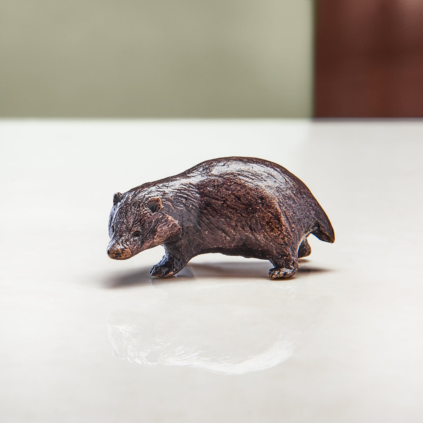 
                  
                    Miniature bronze figurine of a badger. Ideal as a bronze anniversary gift or thoughtful birthday gift.
                  
                