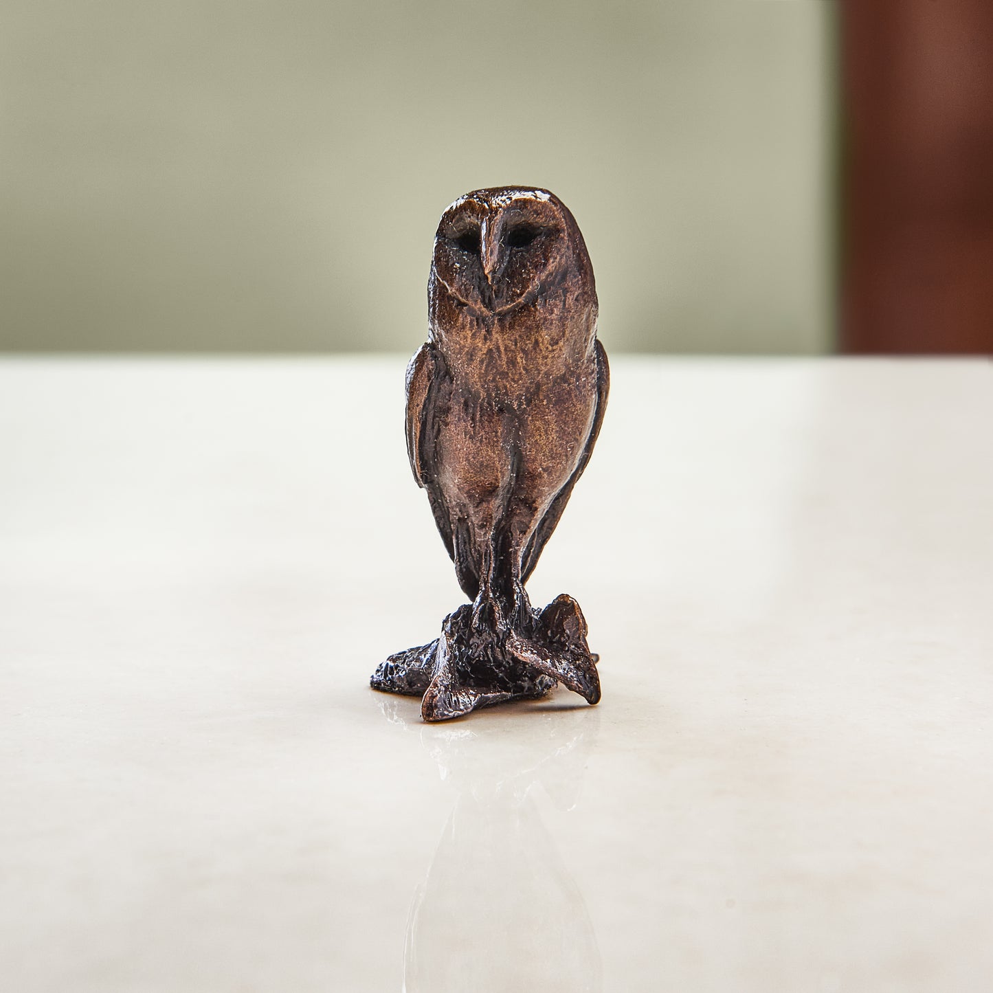 Miniature bronze figurine of a wide-eyed barn owl. A perfect bronze anniversary gift.