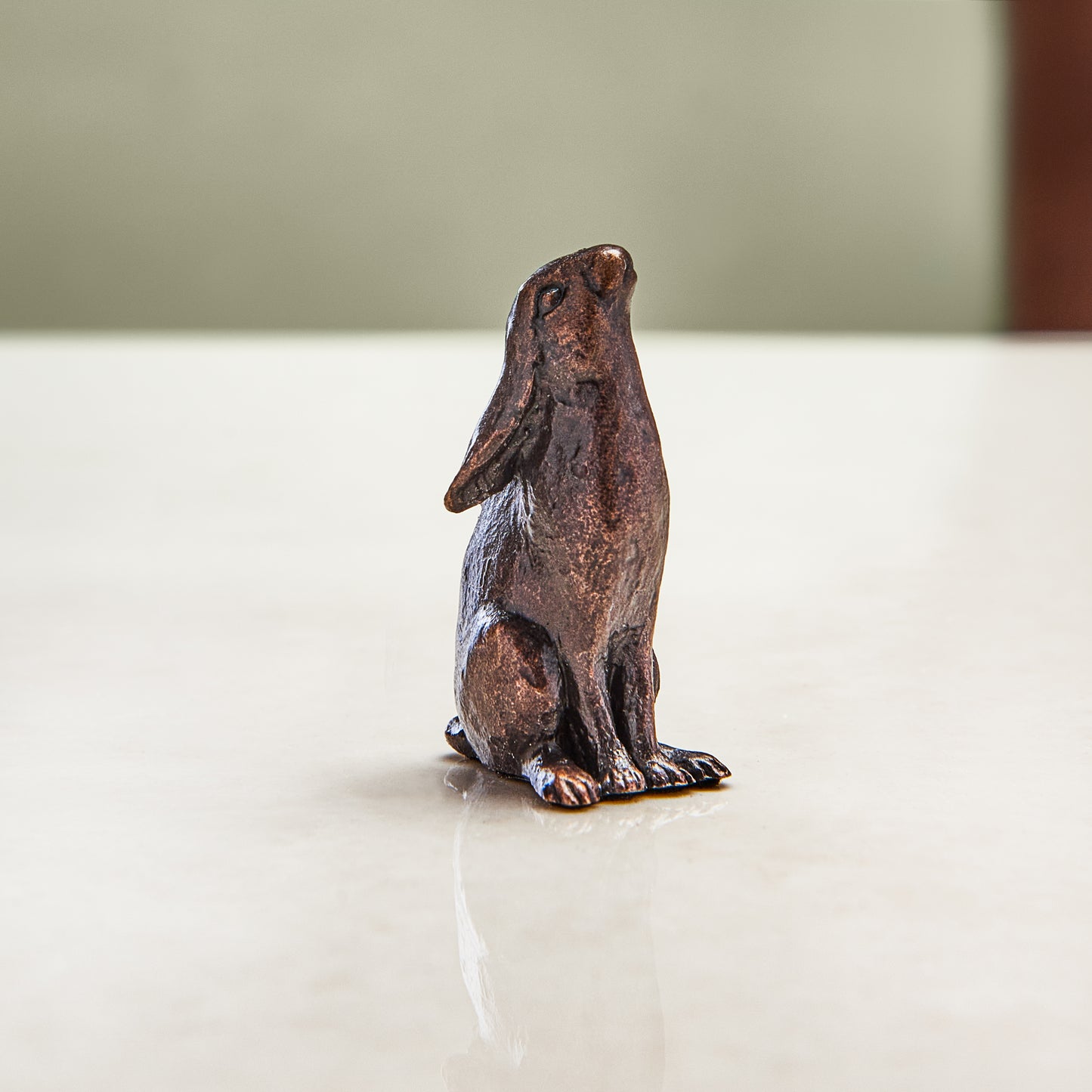 Miniature bronze figurine of a moon gazing hare. Give as a bronze anniversary gift or thoughtful Christening gift.