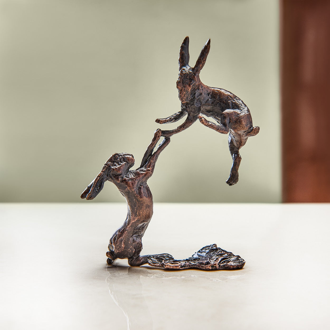 
                  
                    Miniature bronze figurine of a pair of boxing hares. A thoughtful springtime birthday gift or gift to celebrate an 8th wedding anniversary.
                  
                