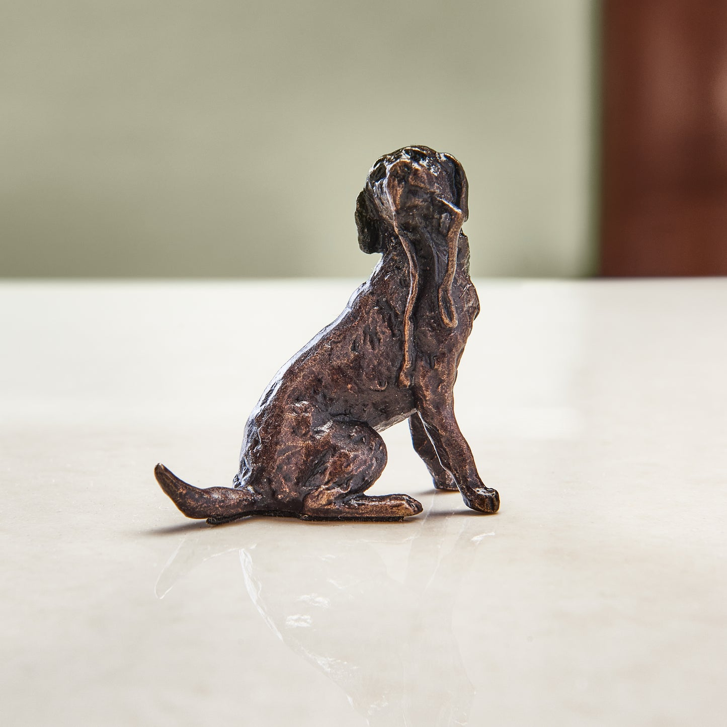 Miniature bronze figurine of a labrador. A thoughtful bronze anniversary gift or birthday gift for dog lovers.