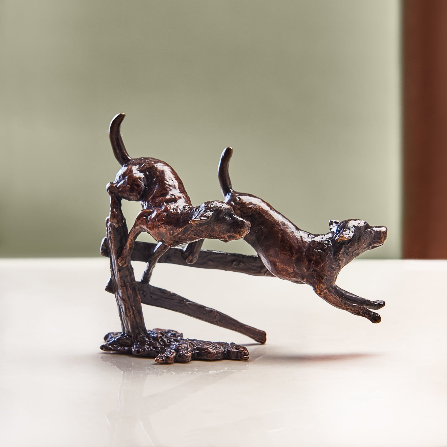 
                  
                    Miniature bronze figurine of two eagerly running labradors in the great outdoors. Ideal as a thoughtful birthday or bronze anniversary gift.
                  
                