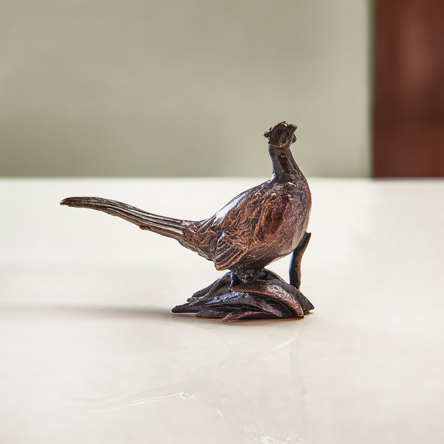 Miniature bronze figurine of a pheasant perched on a branch. A perfect 8th anniversary gift.