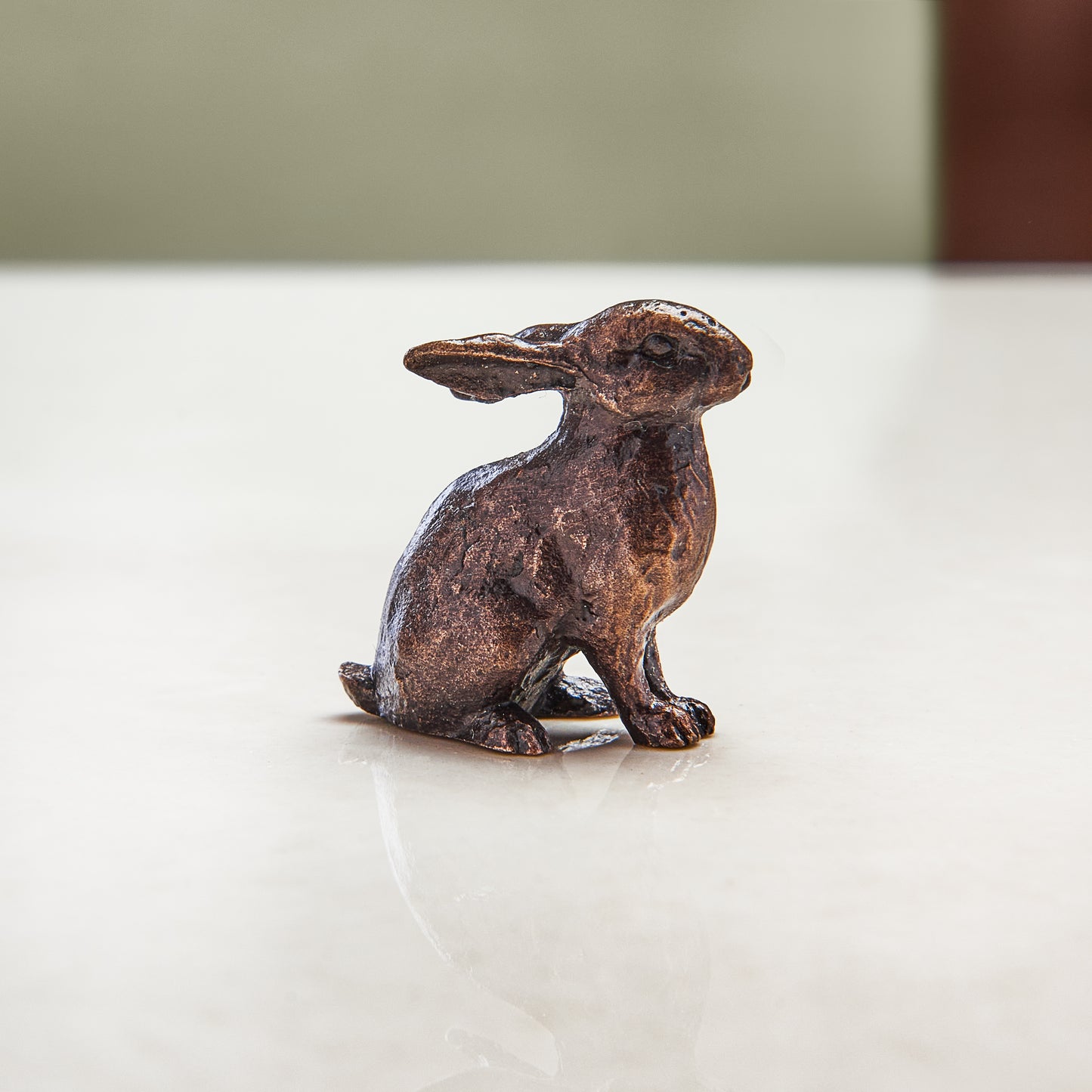 Miniature bronze figurine of a rabbit. Give as a bronze anniversary gift or thoughtful birthday gift.