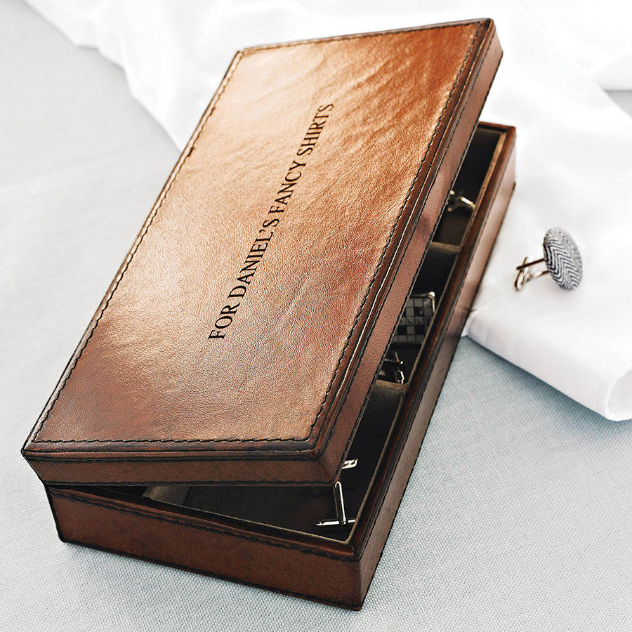 
                  
                    Rectangular tan leather cufflink box with four suede lined compartments. To safely store cufflinks, rings and bracelets Personalise for a perfect wedding anniversary, birthday or Father’s Day gift.
                  
                
