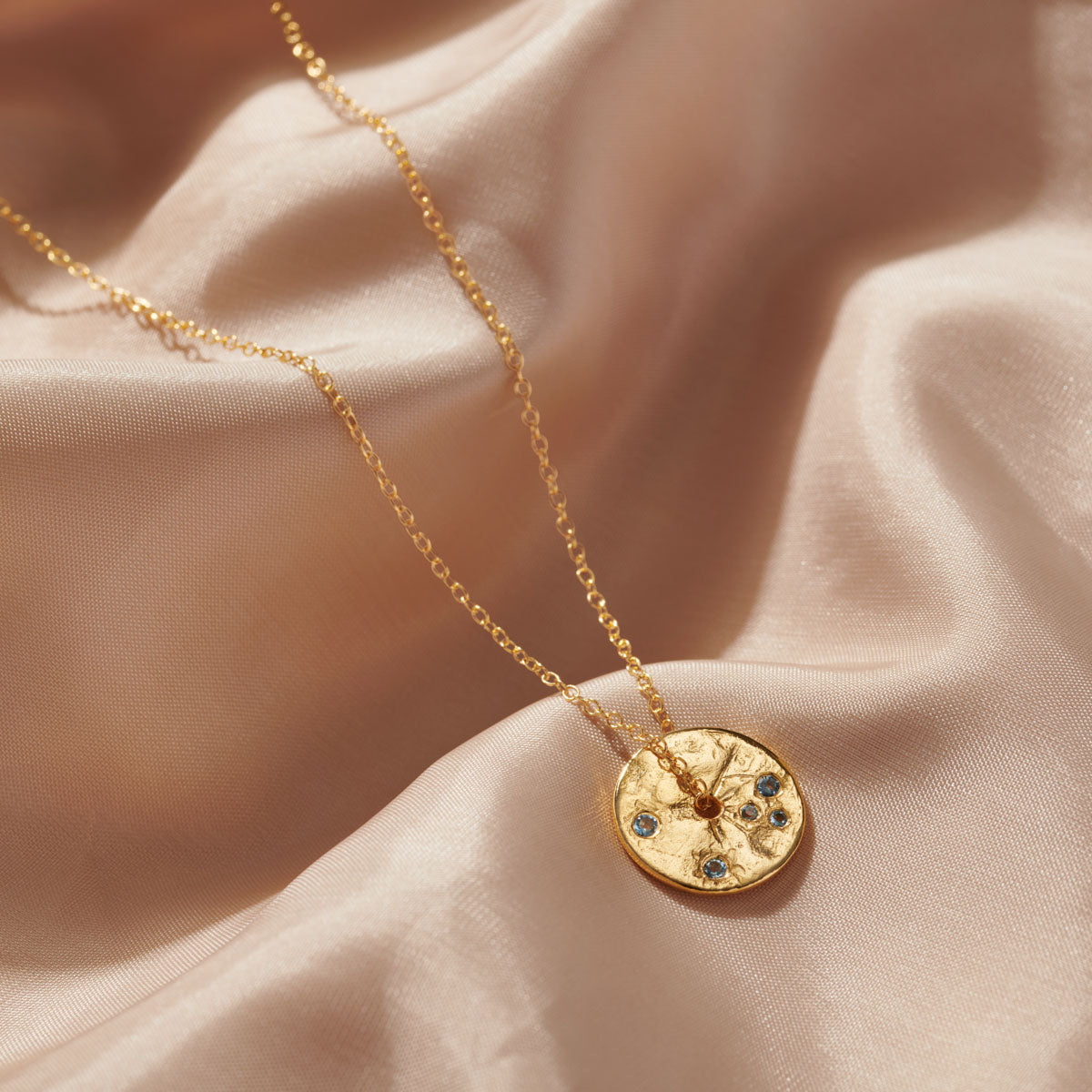March birthstone necklace with aquamarine gemstones by Claudette Worters. Perfect gift for a March birthday.