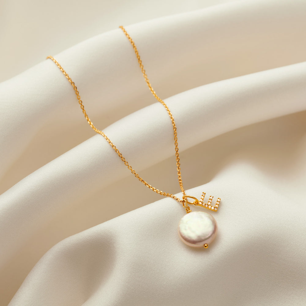 Claudette Worters diamond initial pendant with fresh water pearl on gold chain. Makes the perfect Bridesmaid gift.