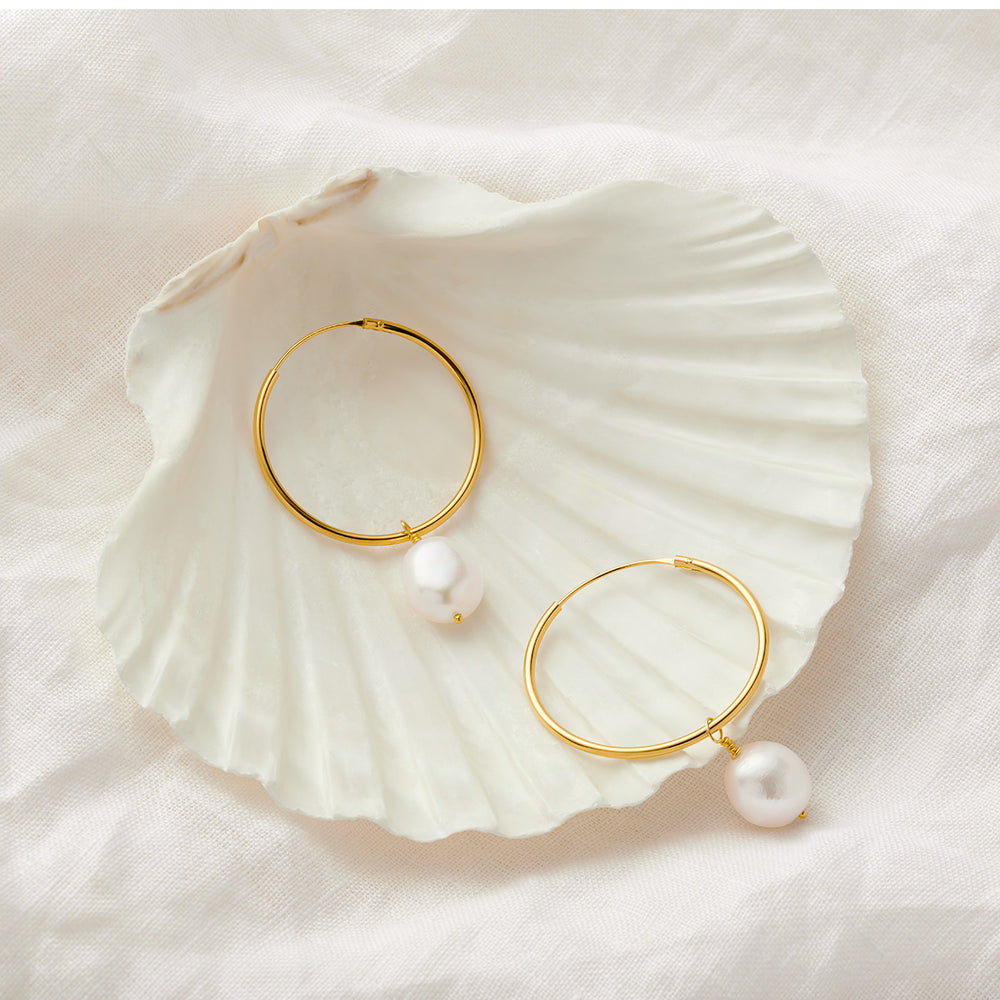 
                  
                    Large Gold Hoop Earrings With White Freshwater Pearls
                  
                