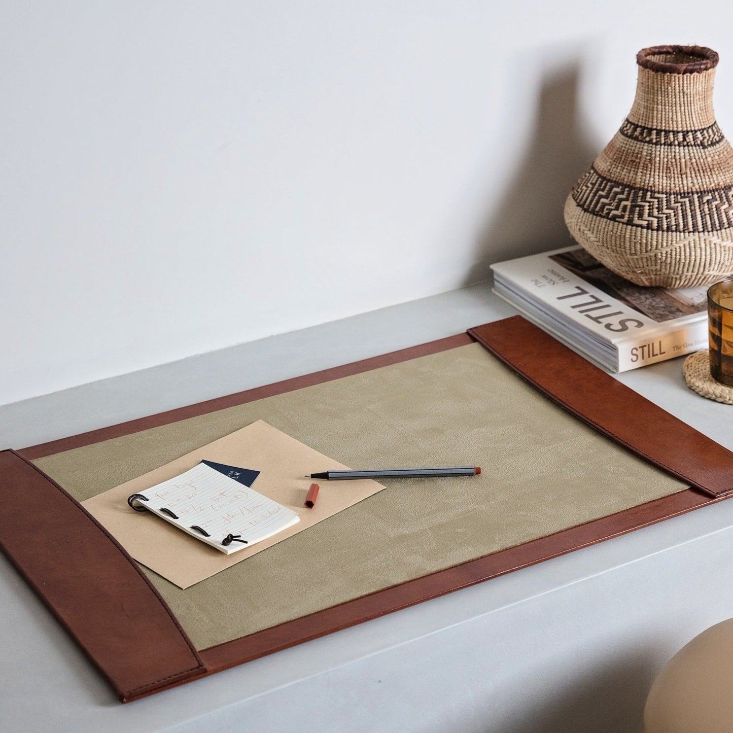 
                  
                    Tan leather desk blotter that protects work spaces and creates a comfortable writing area. Part of a collection of luxury desk accessories that make a thoughtful gift for him or her.
                  
                