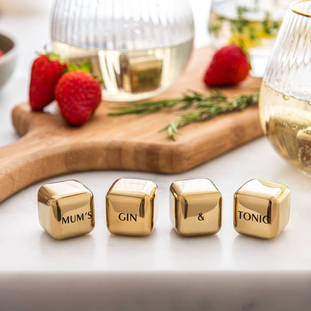 Set of four personalised gold finish stainless steel ice cubes. Add initials, names or dates to create a thoughtful Mother’s Day or Christmas gift.