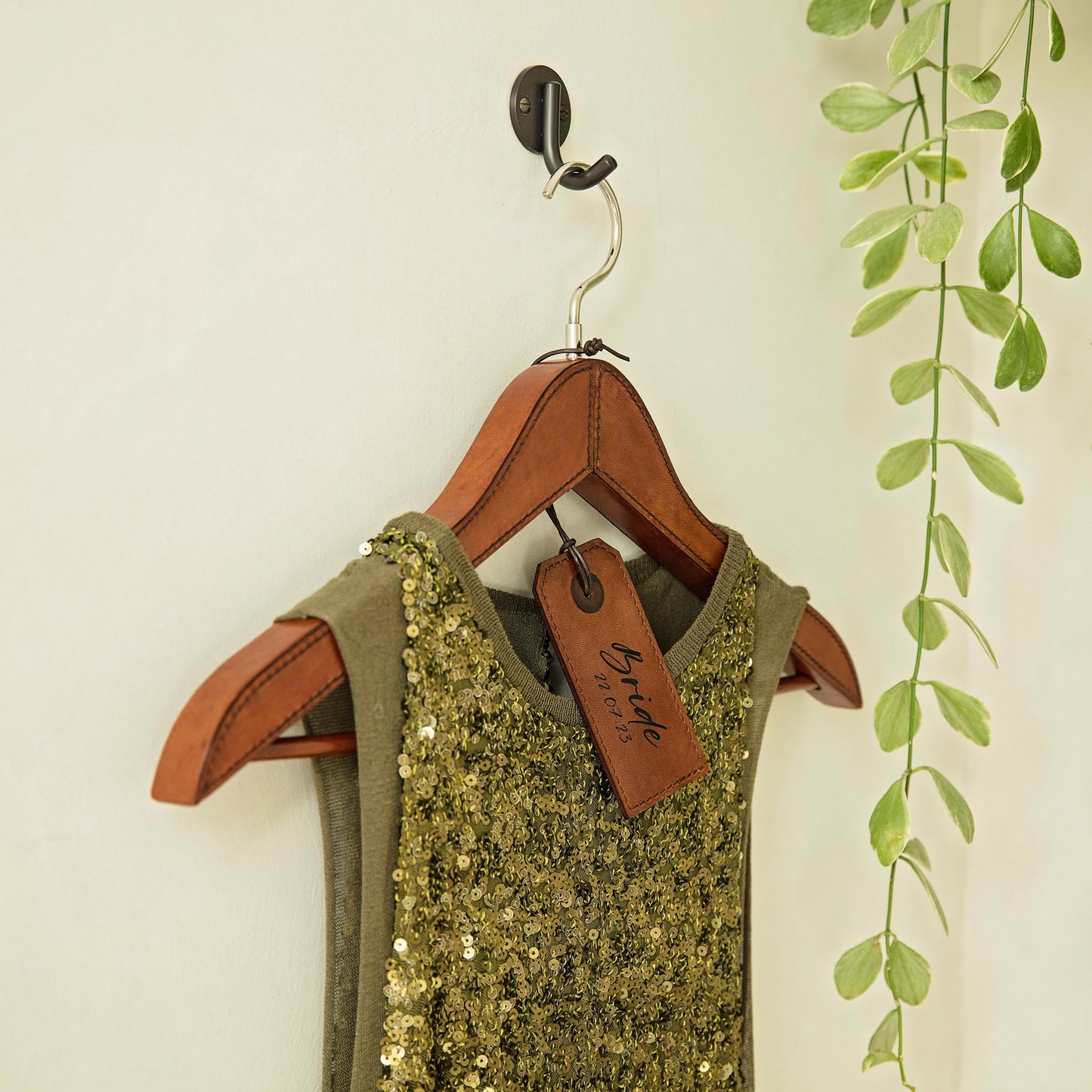 Personalised leather coat hanger ideal for her wedding dress or special wedding outfit. A thoughtful gift for the bride, maid of honour or bridesmaids.