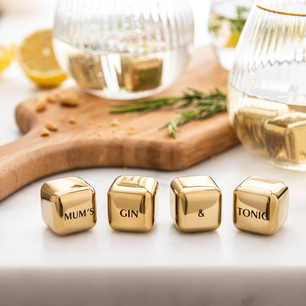 Set of four personalised gold finish stainless steel ice cubes. Add initials, names or dates to create a thoughtful Mother’s Day or Christmas gift.