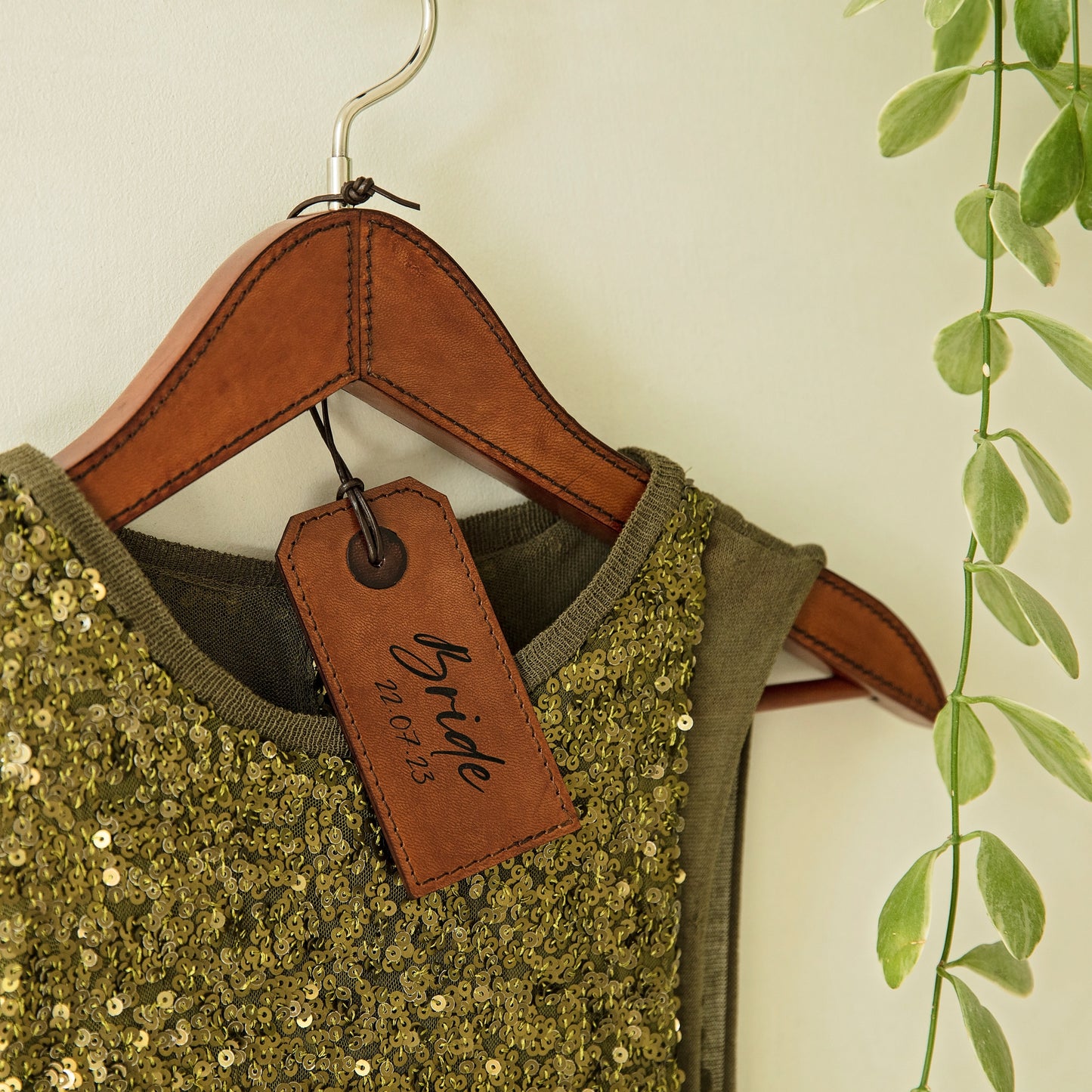 Personalised leather coat hanger ideal for her wedding dress or special wedding outfit. A thoughtful gift for the bride, maid of honour or bridesmaids.