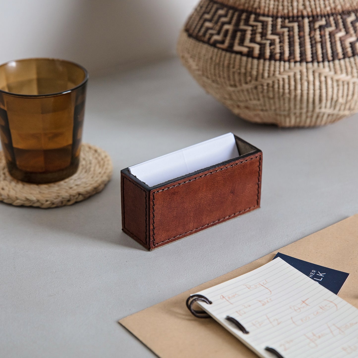Timeless tan leather business card holder for easy desktop storage. Personalise for a thoughtful gift to celebrate a new job.