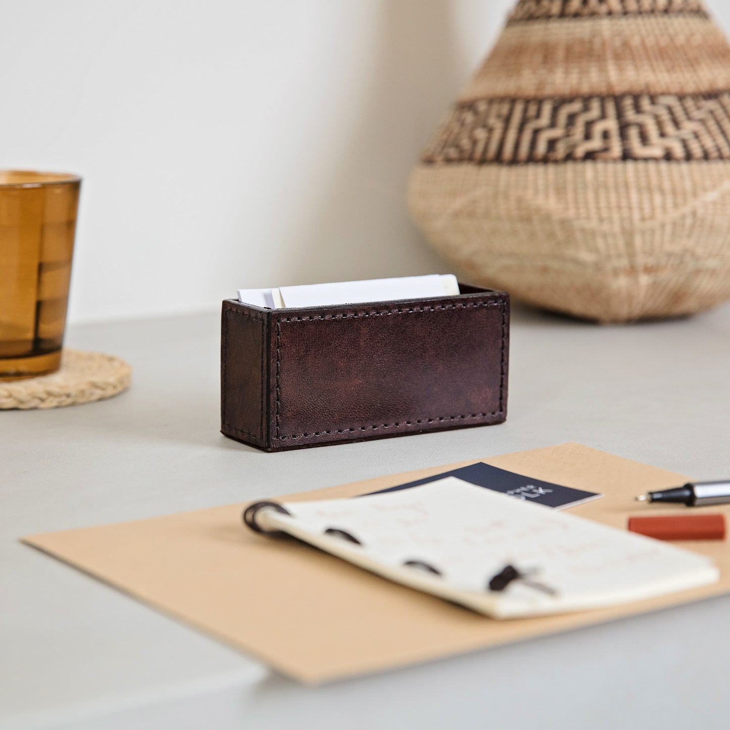 Timeless dark brown leather business card holder for easy desktop storage. Personalise for a thoughtful gift to celebrate a new job.