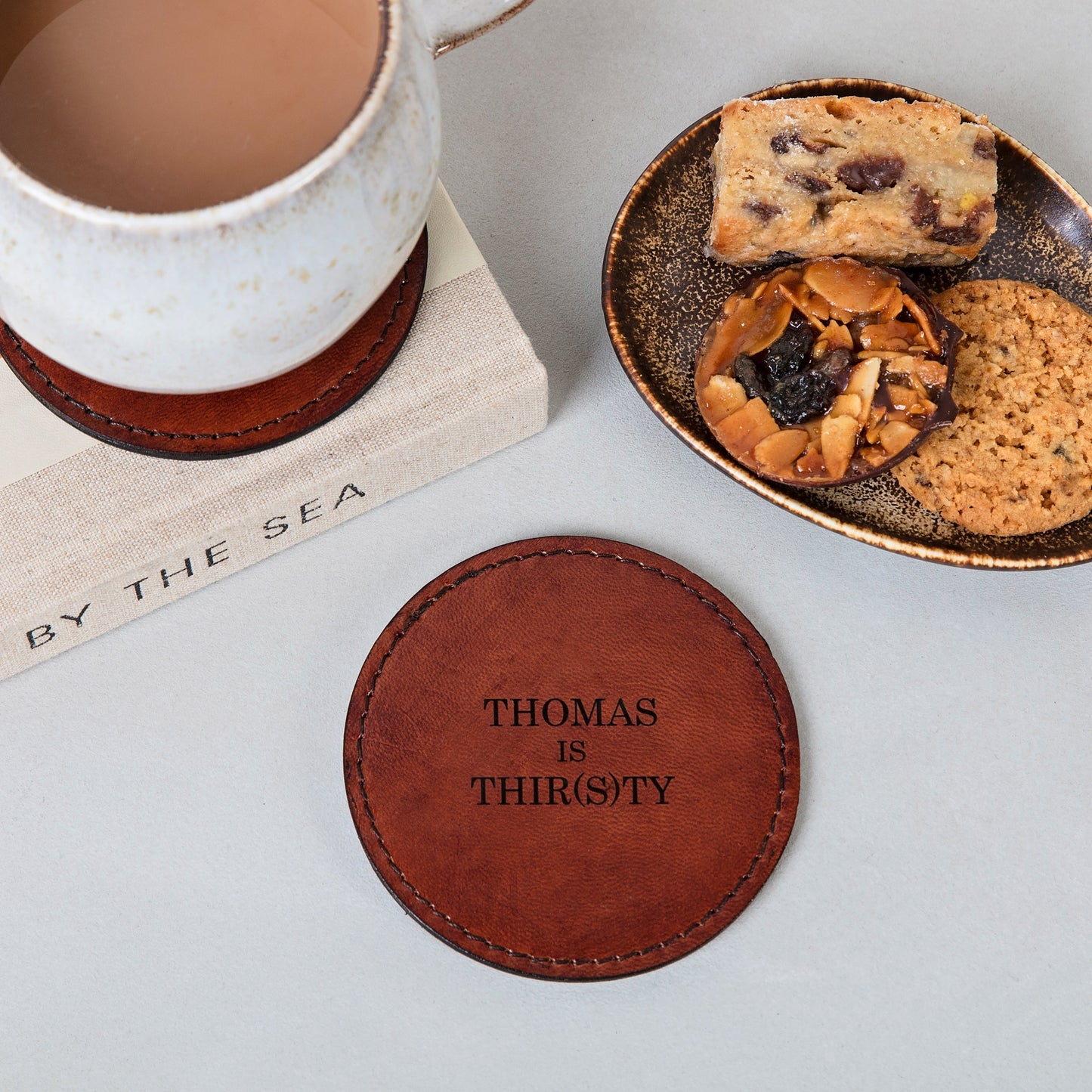 Single leather coaster. Can be personalised to create a unique third anniversary of father's day gift.