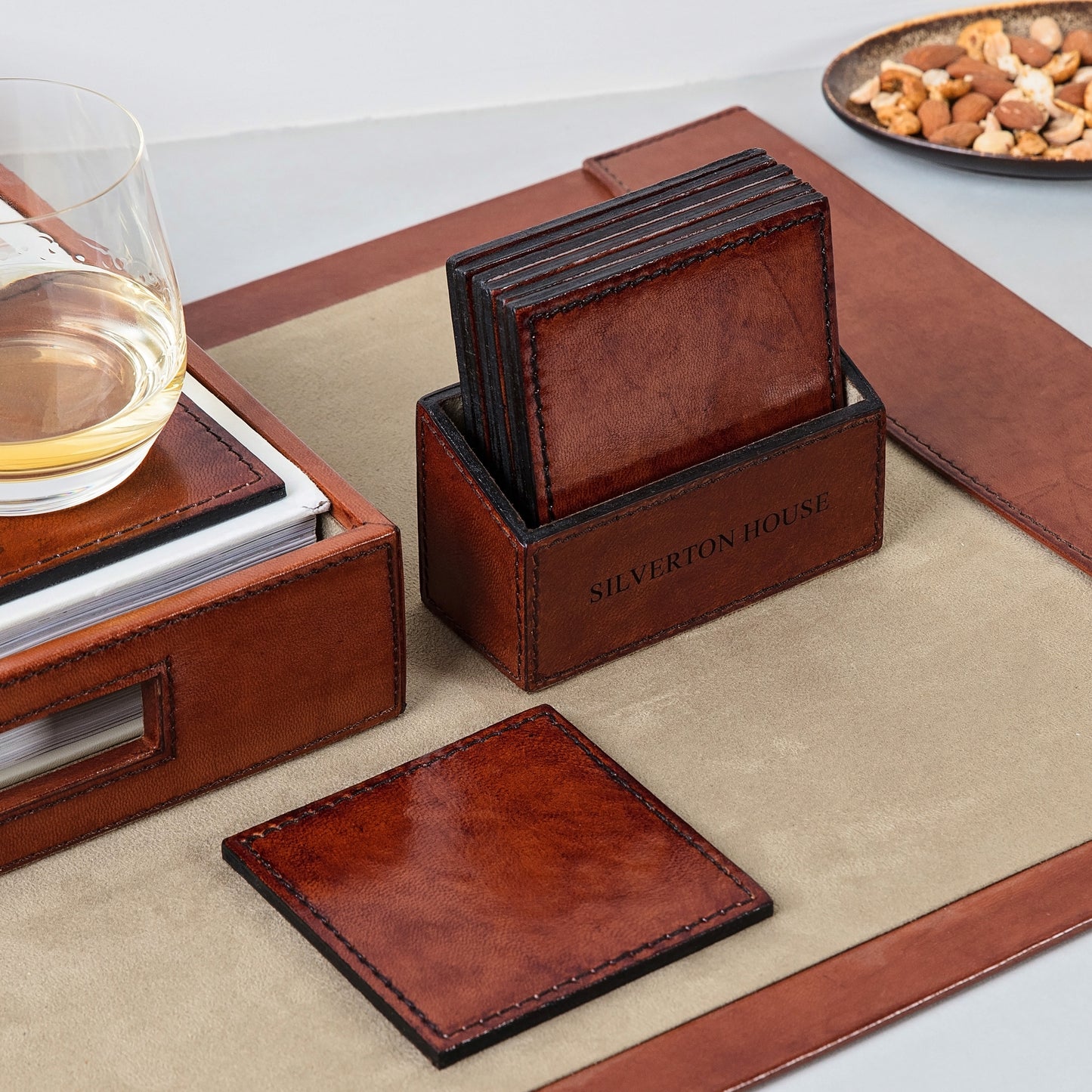 Set of six square leather coasters in a holder. Can be personalised to create a unique third anniversary, Father's Day or retirement gift.