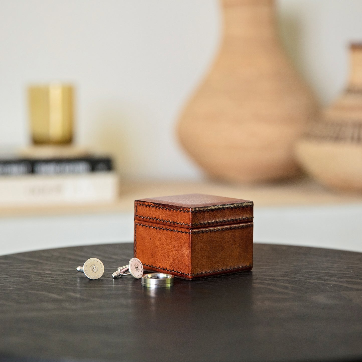 
                  
                    Square small cufflink box in tan leather, can be personalised as a timeless gift for a special birthday or as a best man gift.
                  
                