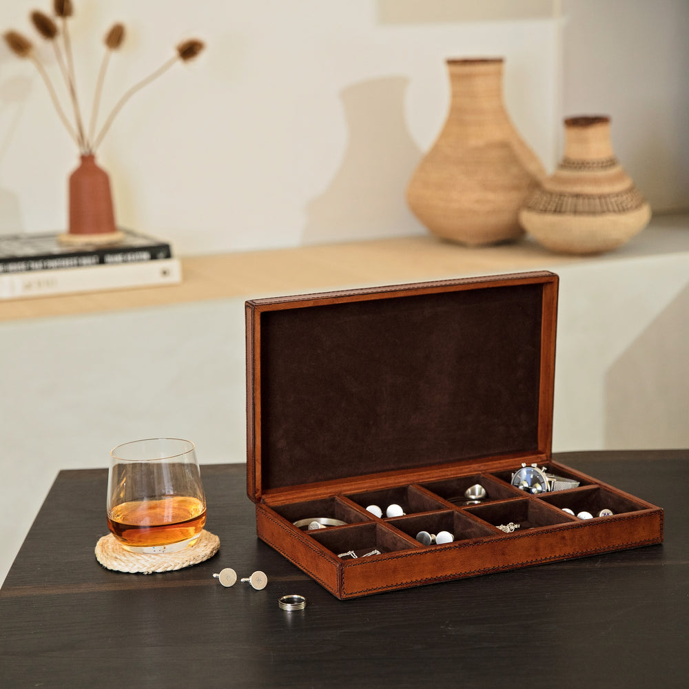 Large cufflink box in tan leather, with 8 small compartments to hold cufflinks, rings, watches and bracelets. Can be personalised as a timeless gift for a 21st birthday or third anniversary.
