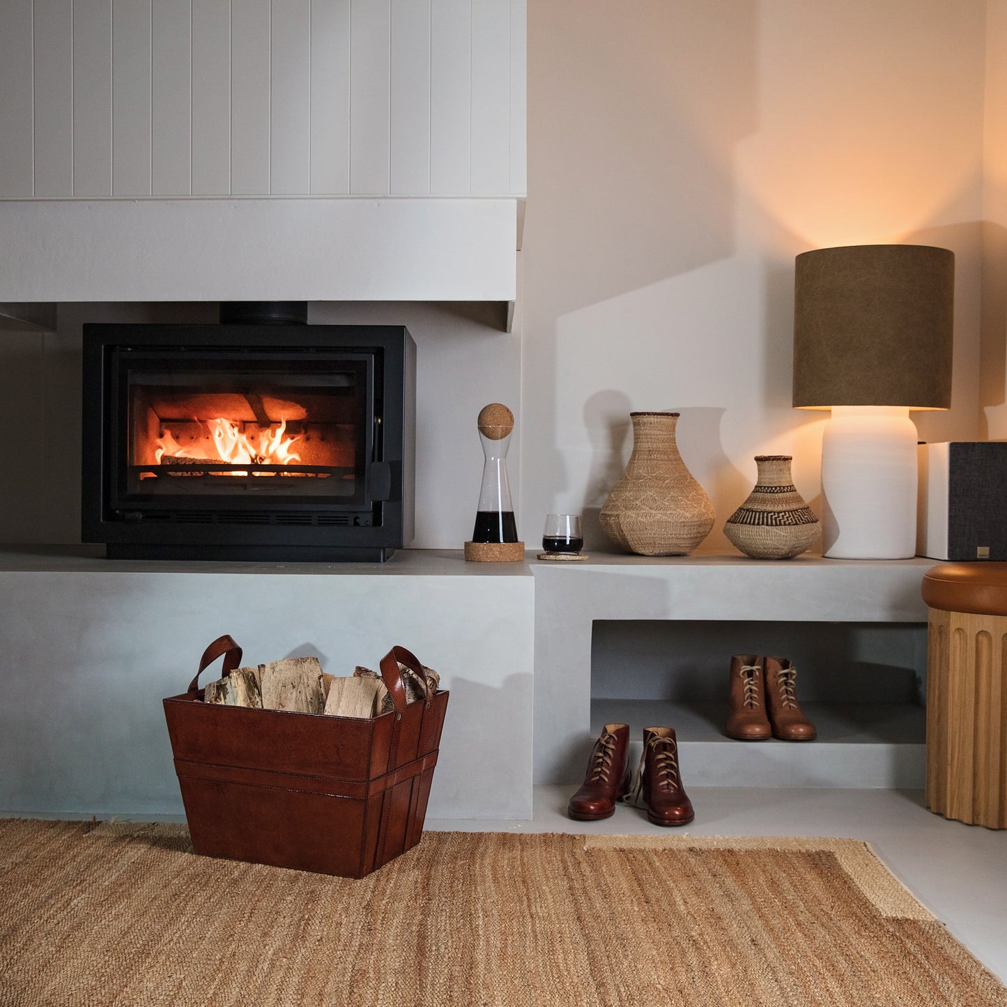 Sturdy rectangular tan leather log basket with handles. Ideal for carrying and storing logs and kindling. Personalise for a thoughtful retirement gift.