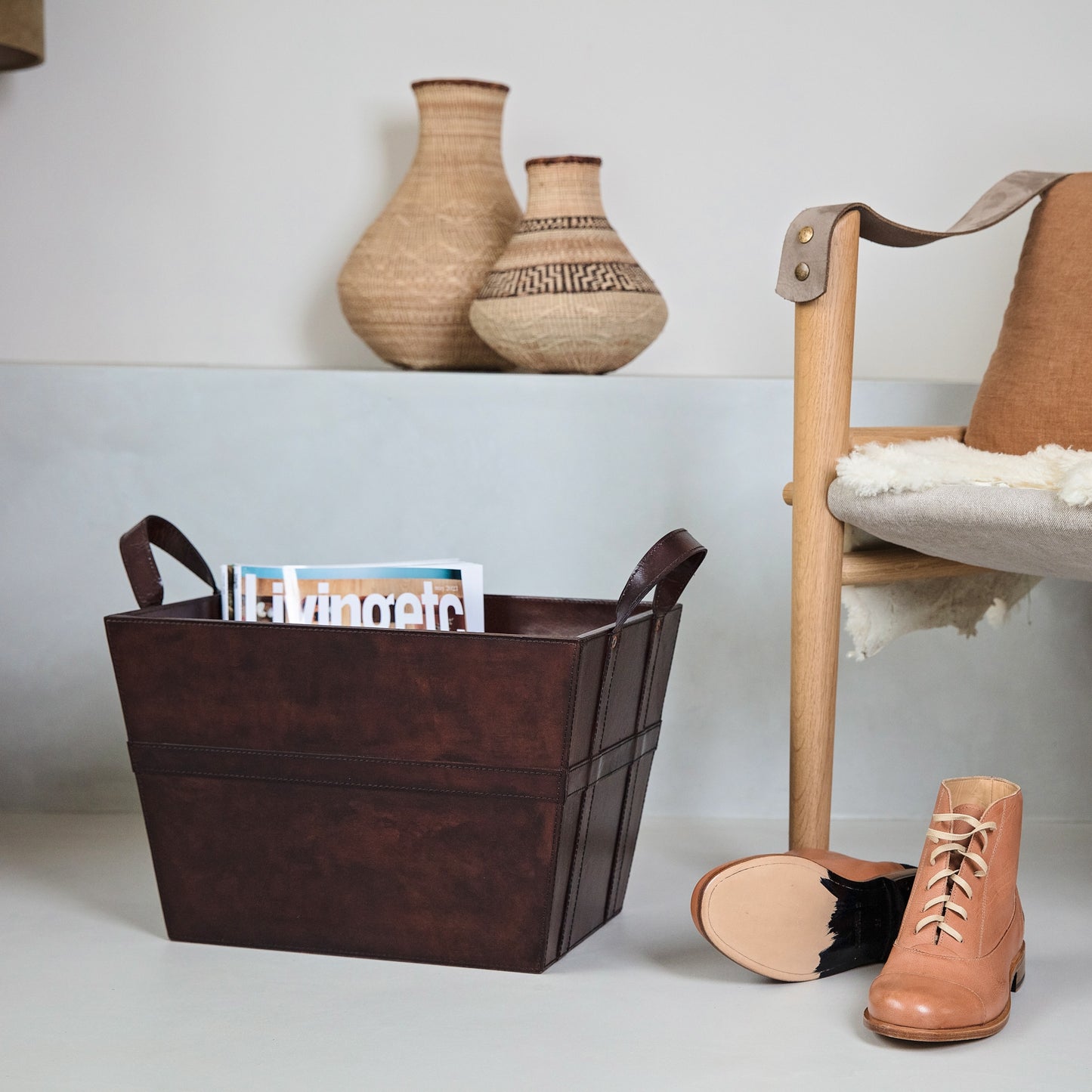 Sturdy rectangular brown leather magazine basket with handles. Ideal for storing magazines or newspapers, add a personalised tag for a thoughtful 60th birthday gift.