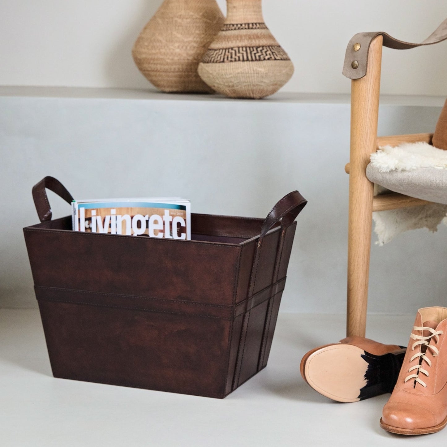 Sturdy rectangular brown leather magazine basket with handles. Ideal for storing magazines or newspapers, add a personalised tag for a thoughtful 60th birthday gift.