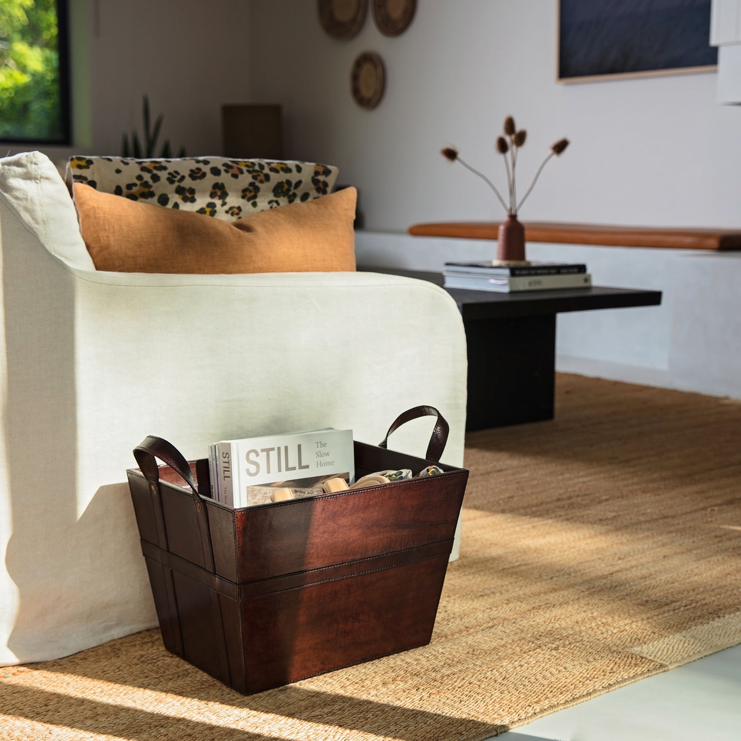 Sturdy rectangular brown leather magazine basket with handles. Ideal for storing magazines or newspapers, add a personalised tag for a thoughtful 60th birthday gift.