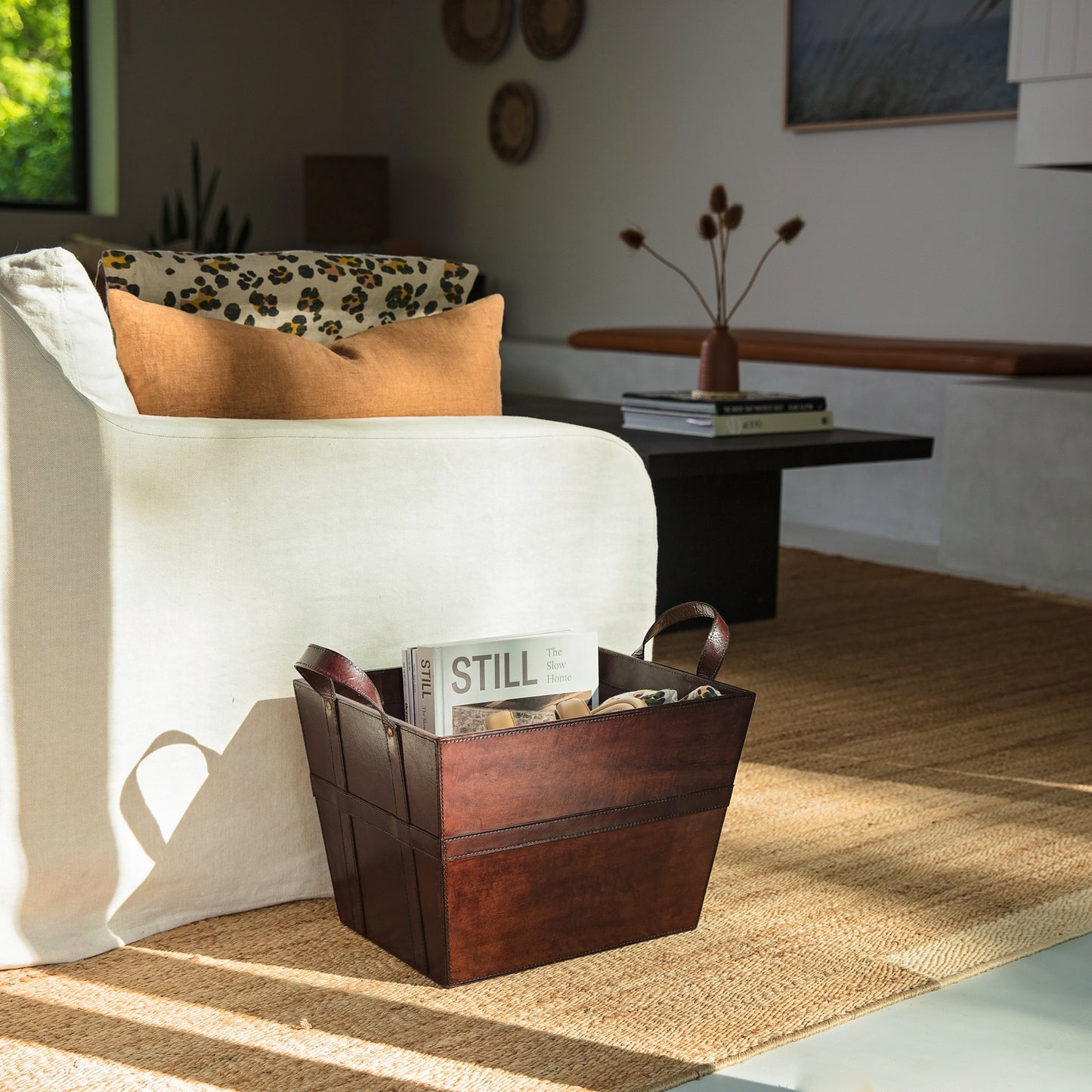 Sturdy rectangular brown leather magazine basket with handles. Ideal for storing magazines or newspapers, add a personalised tag for a thoughtful 60th birthday gift.
