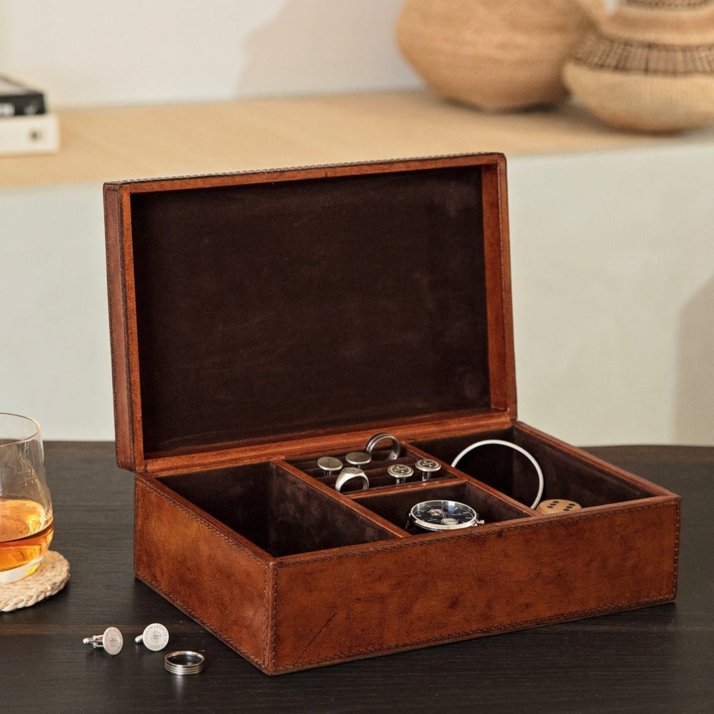 Rectangular men’s jewellery box in tan leather, with ring cushion, watch pillow and lined with micro suede. Personalise with a name or date as a keepsake 21st birthday gift for him.