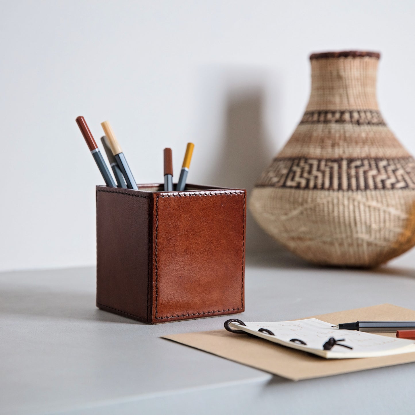 Elegant rectangular tan leather pen pot for easy desktop storage. Personalise for a thoughtful gift for the home, office or workplace.