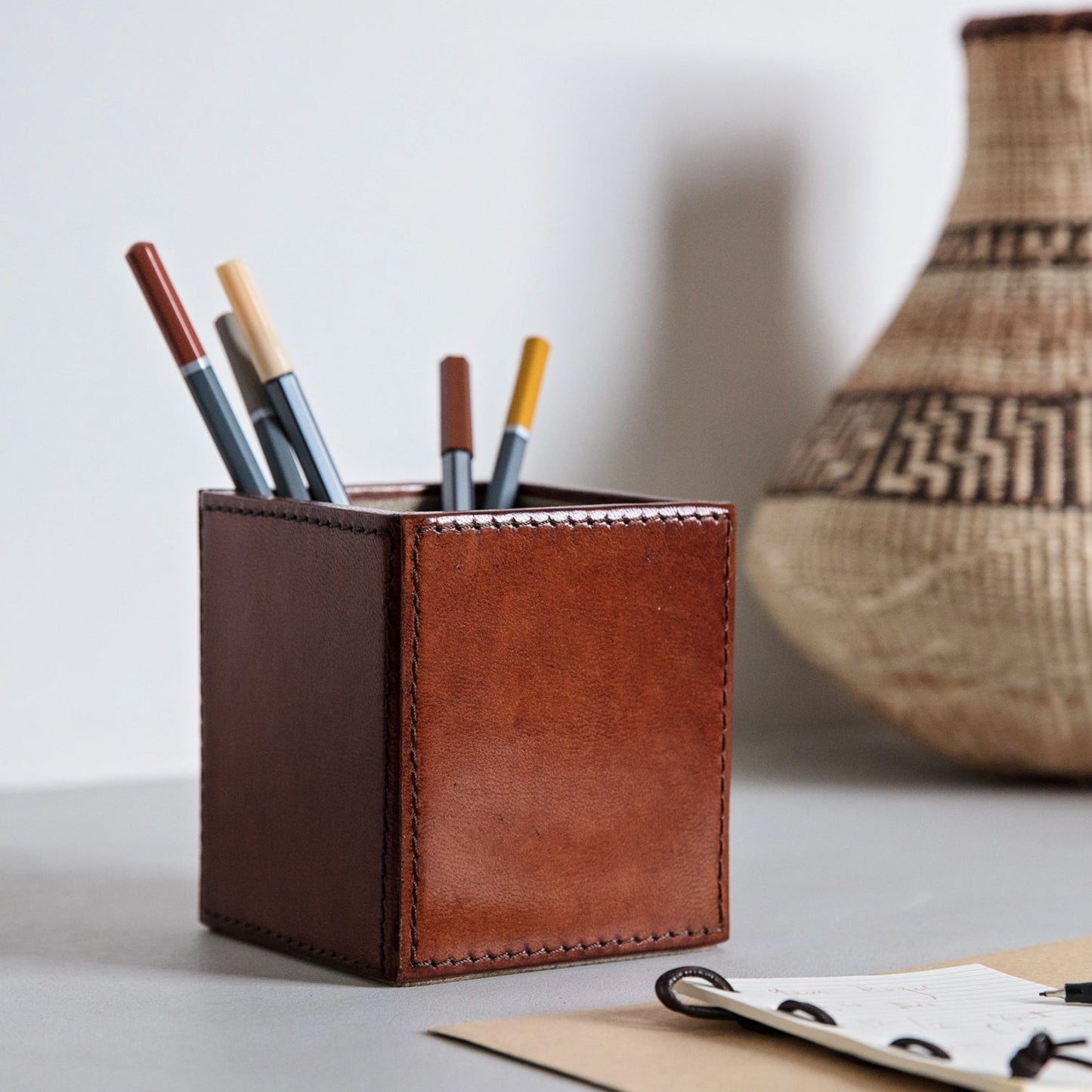 Elegant rectangular tan leather pen pot for easy desktop storage. Personalise for a thoughtful gift for the home, office or workplace.