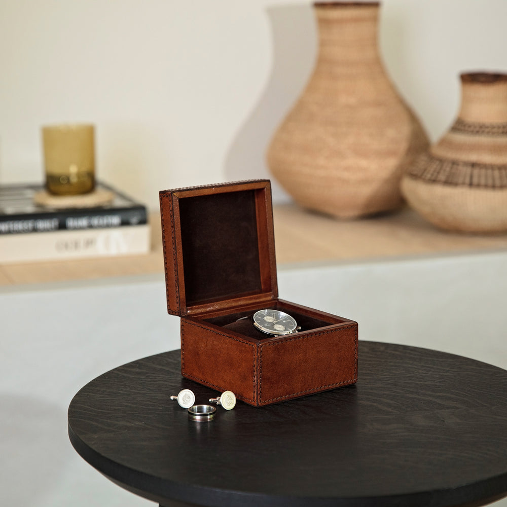 Square tan leather men’s watch box with removeable watch pillow. Personalise as a thoughtful gift for your groom, or as a birthday gift for your son or husband.