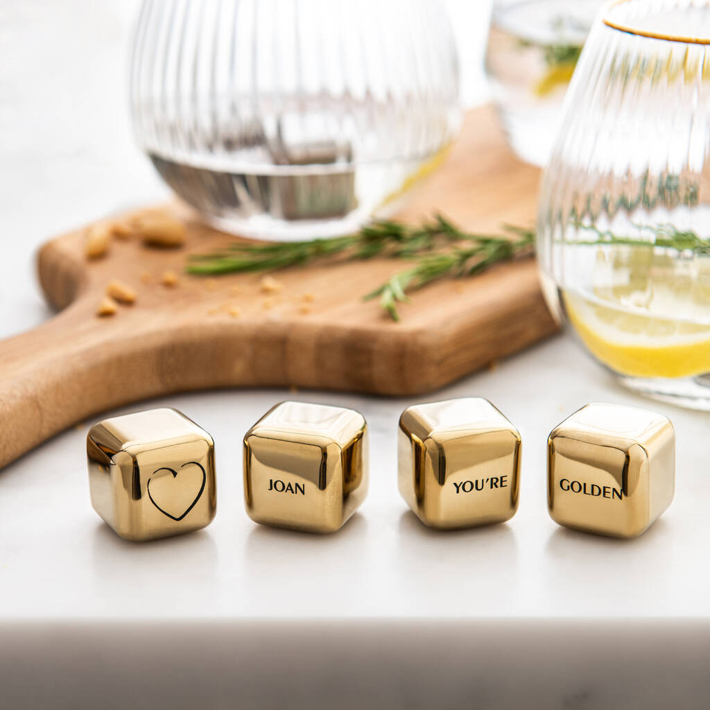 Set of four personalised gold finish stainless steel ice cubes. Add initials, names or a playful message for a unique birthday gift.