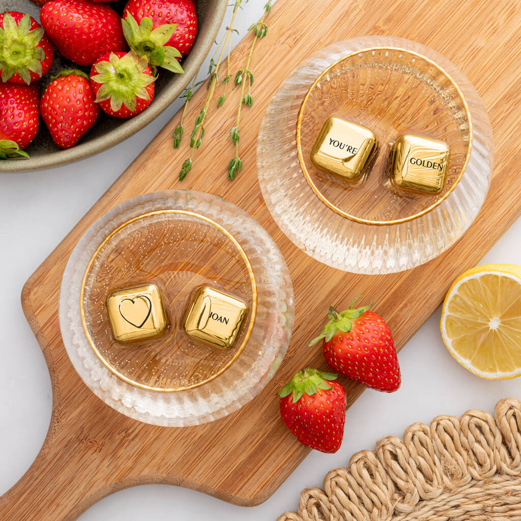 Set of four personalised gold finish stainless steel ice cubes. Add initials, names or a playful message for a unique birthday gift.