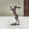 Miniature bronze figurine of a boxing hare. Give as a bronze anniversary gift or thoughtful birthday gift.