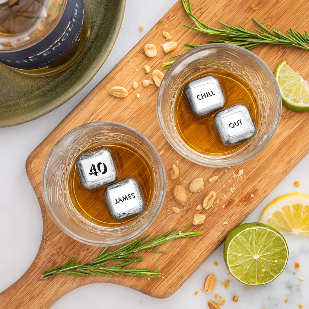 Set of four personalised stainless steel ice cubes. Add initials, names or dates to create a thoughtful Father’s Day or Christmas gift.