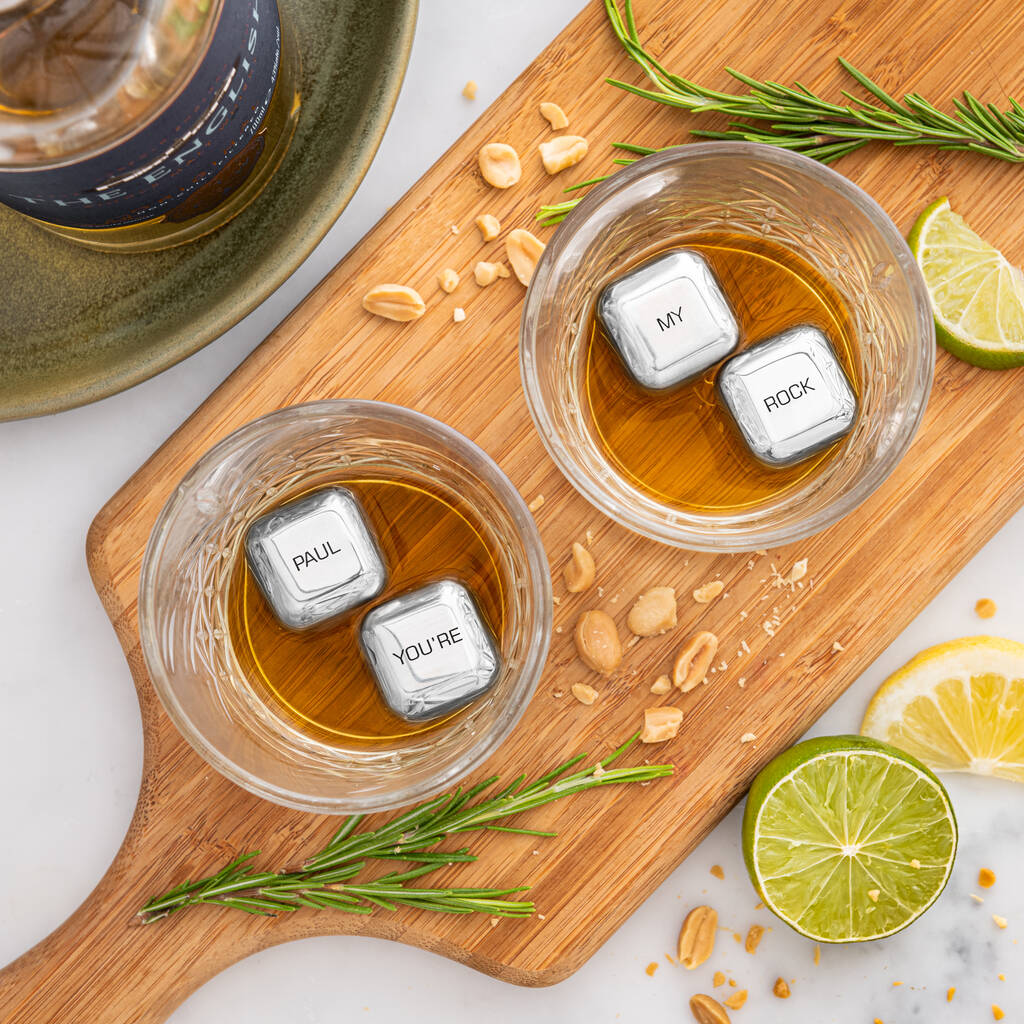 Set of four personalised stainless steel ice cubes. Add initials, names or dates to create a thoughtful Father’s Day or Christmas gift.
