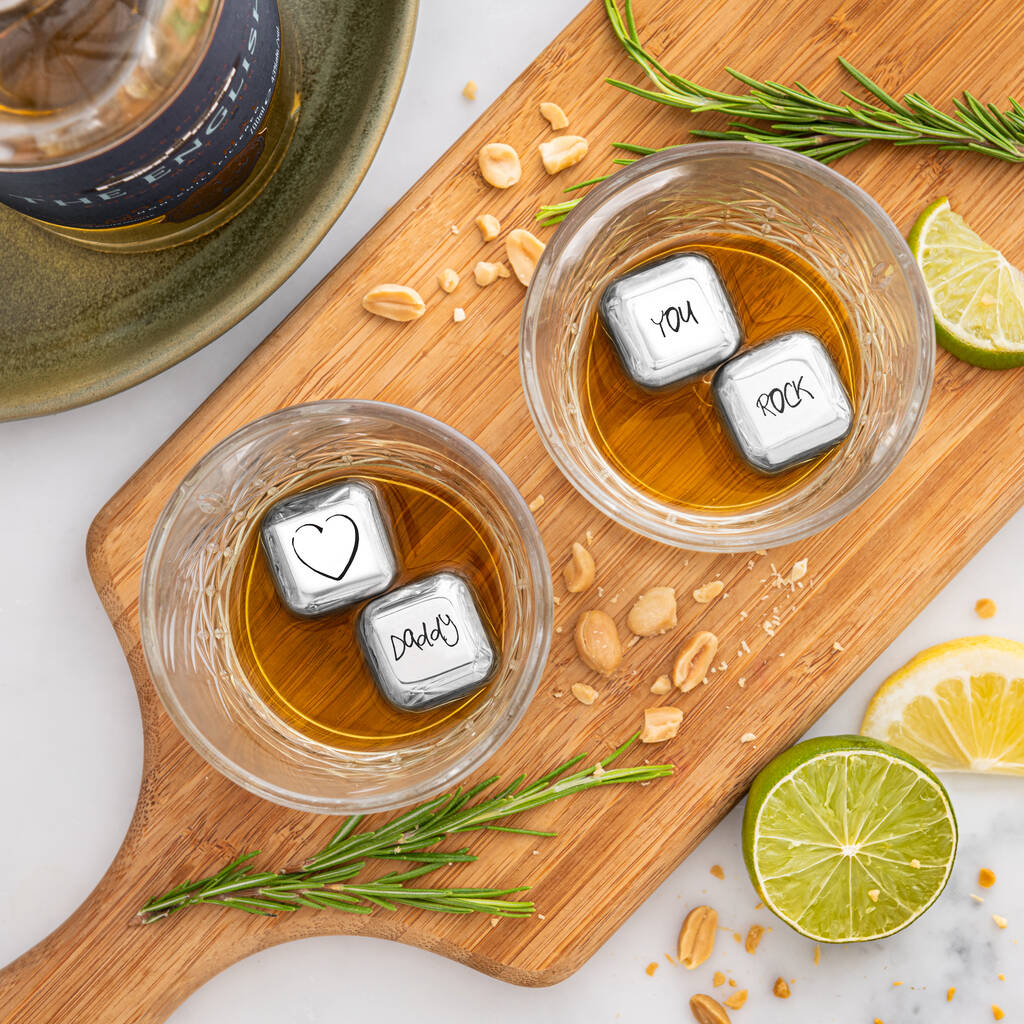 Set of four personalised stainless steel ice cubes. Add initials, names or dates to create a thoughtful Father’s Day or Christmas gift.