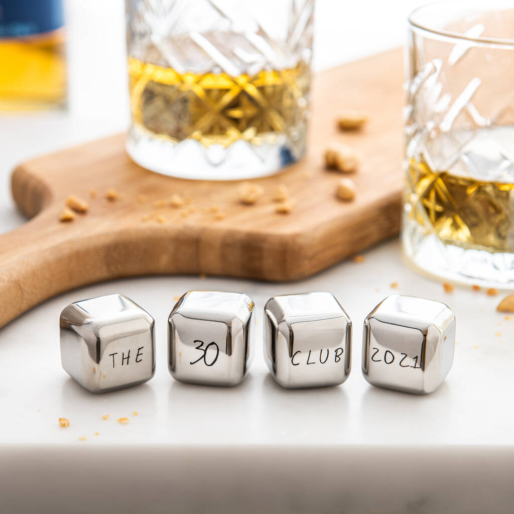 Set of four personalised stainless steel ice cubes. Add initials, names or a fun message as a unique milestone birthday gift.