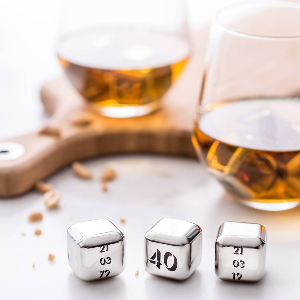 Set of four personalised stainless steel ice cubes. Add initials, names or a fun message as a unique milestone birthday gift.
