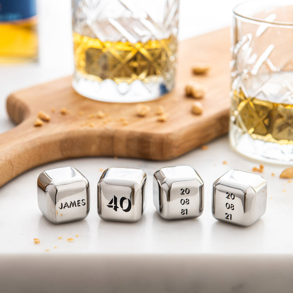 Set of four personalised stainless steel ice cubes. Add initials, names or a fun message as a unique milestone birthday gift.