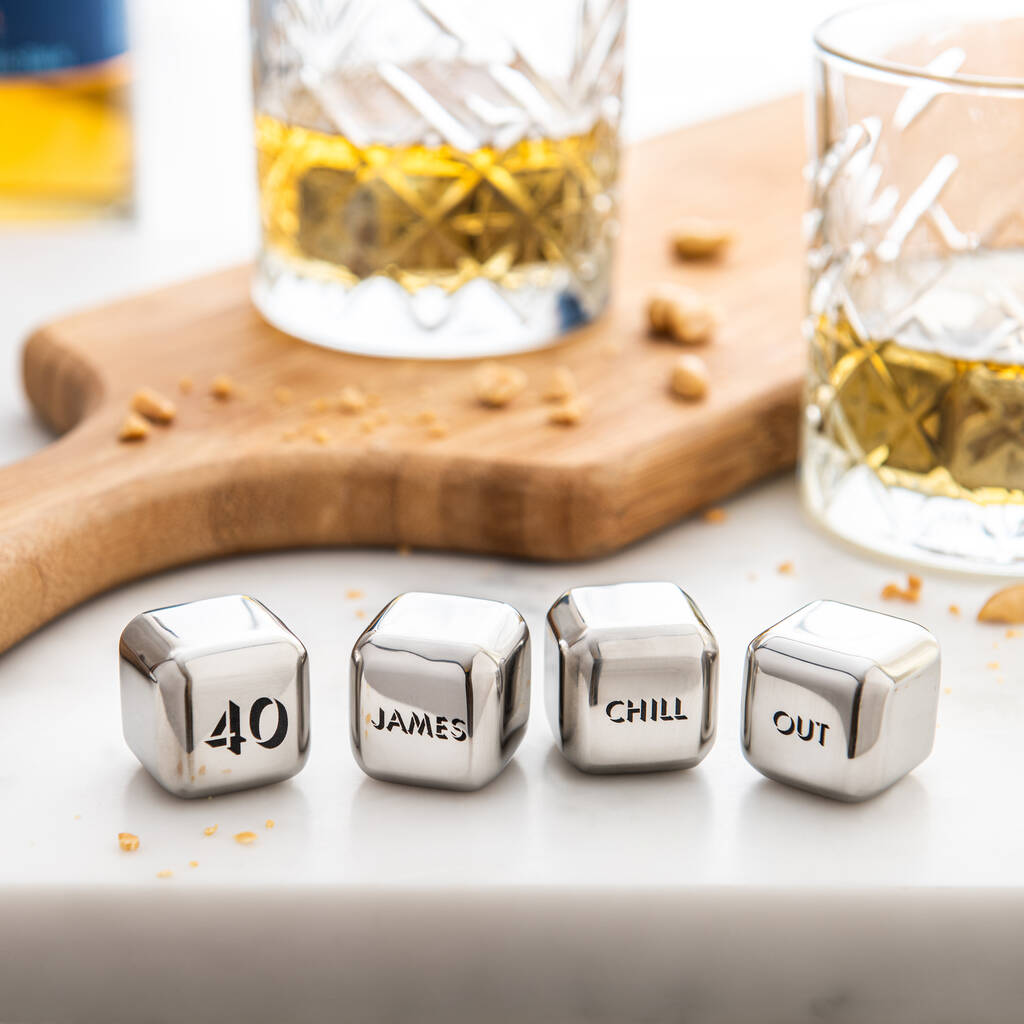Set of four personalised stainless steel ice cubes. Add initials, names or a fun message as a unique milestone birthday gift.