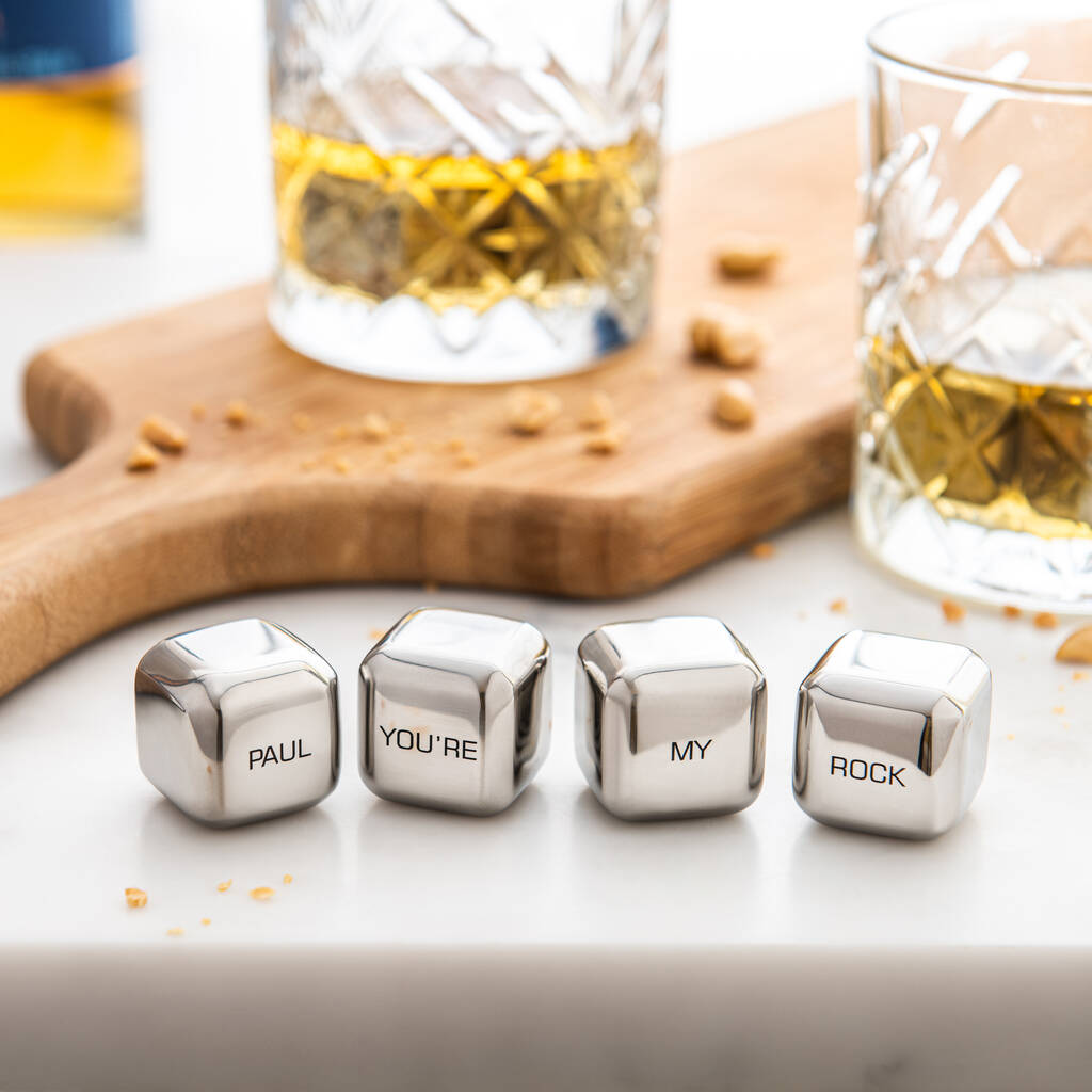 Set of four personalised stainless steel ice cubes. Add initials, names or dates to create a thoughtful Father’s Day or Christmas gift.