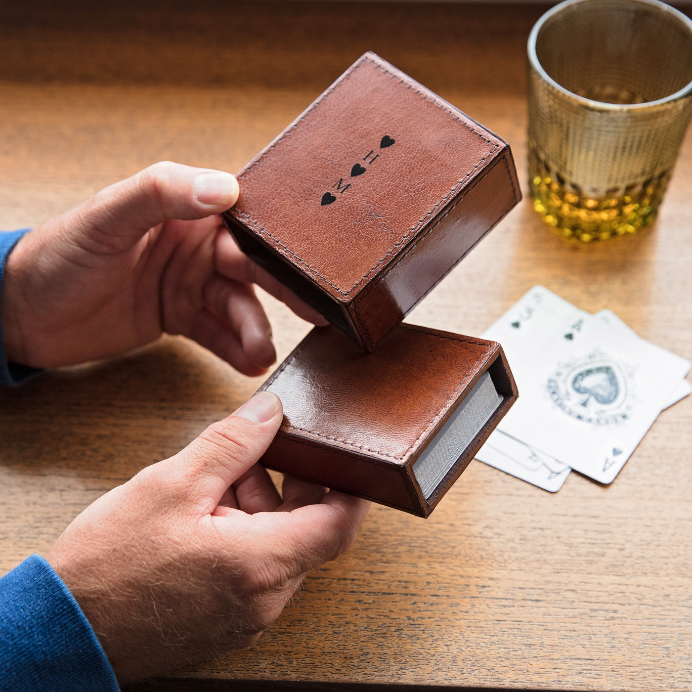 Playing card case made from soft tan leather to hold a single deck of 52 cards. Personalise with a message or name inside and out for a thoughtful birthday gift for him.
