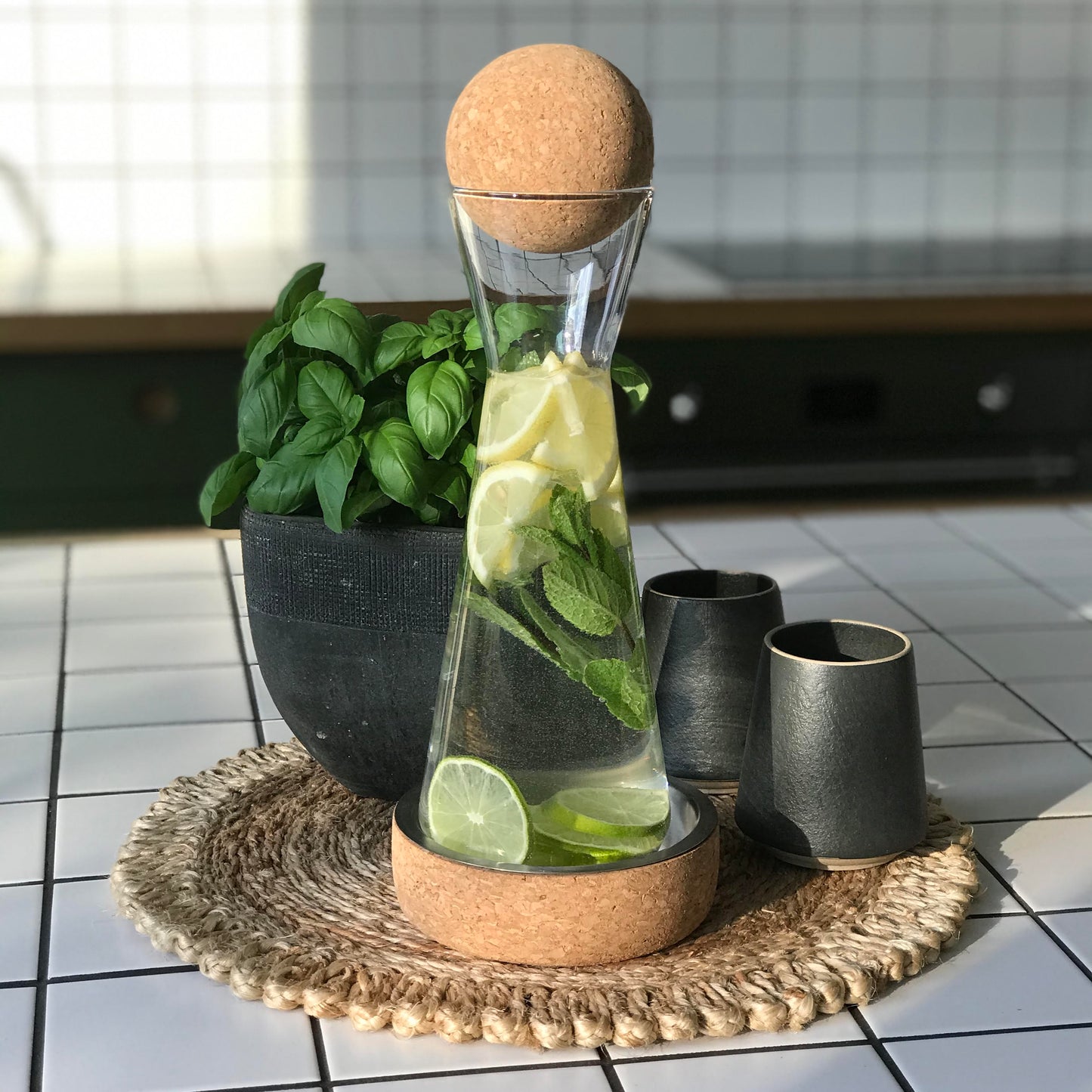 Glass carafe with cork stopper and steel and cork wine coaster to protect surfaces from drips. Add a name or design to create a thoughtful personalised gift.