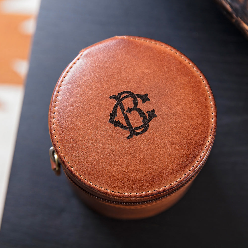 
                  
                    Monogram Leather Travel Jewellery Case - Round
                  
                