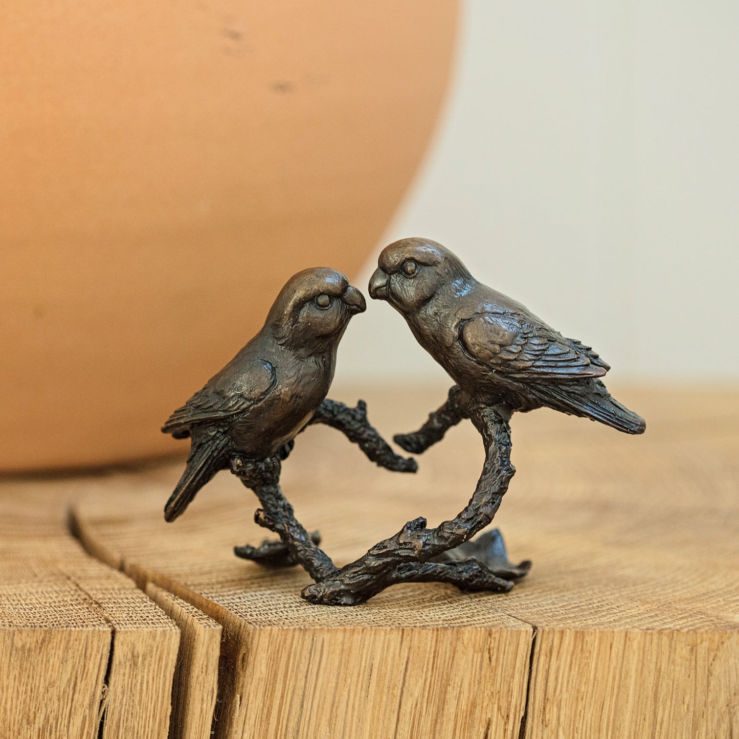 
                  
                    Solid bronze figurine of two lovebirds on a branch. Bronze anniversary gift for him or her.
                  
                