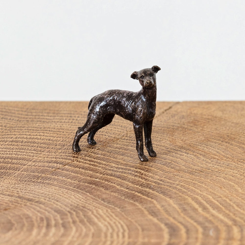 Miniature bronze sculpture of a loveable lurcher, ideal as a thoughtful bronze anniversary gift or birthday gift.